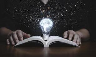 glowing-lightbulb-with-virtual-brain-on-open-book-and-connection-line-for-reading-and-education-make-smart-or-creative-thinking-idea-concept-photo